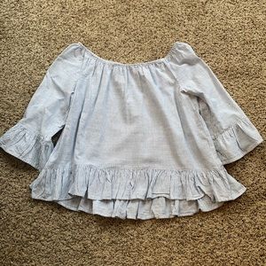 Sanctuary over the shoulder top